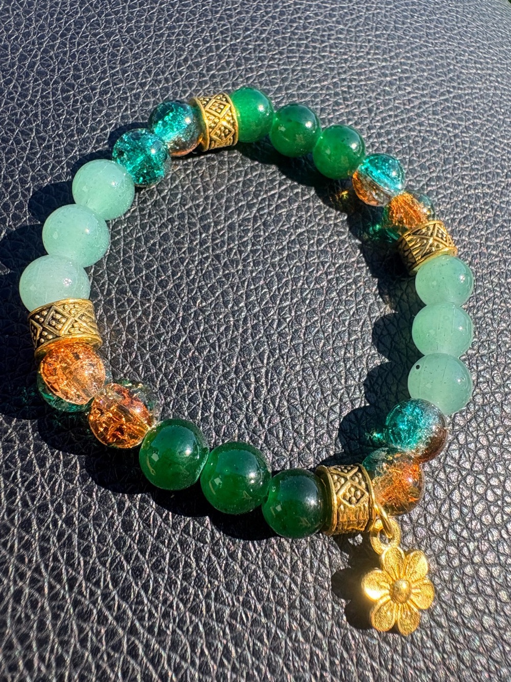 Green and gold accent glass beaded bracelet with flower charm - Picture 2 of 5